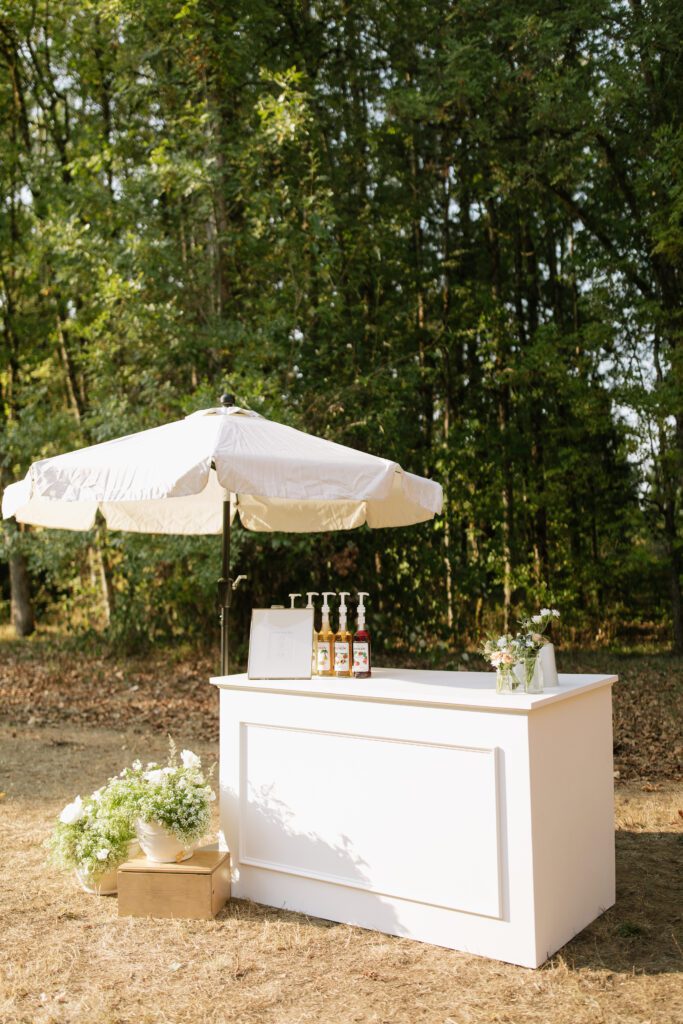 Italian soda bar, featuring a variety of colorful syrups and garnishes for guests to enjoy custom beverages