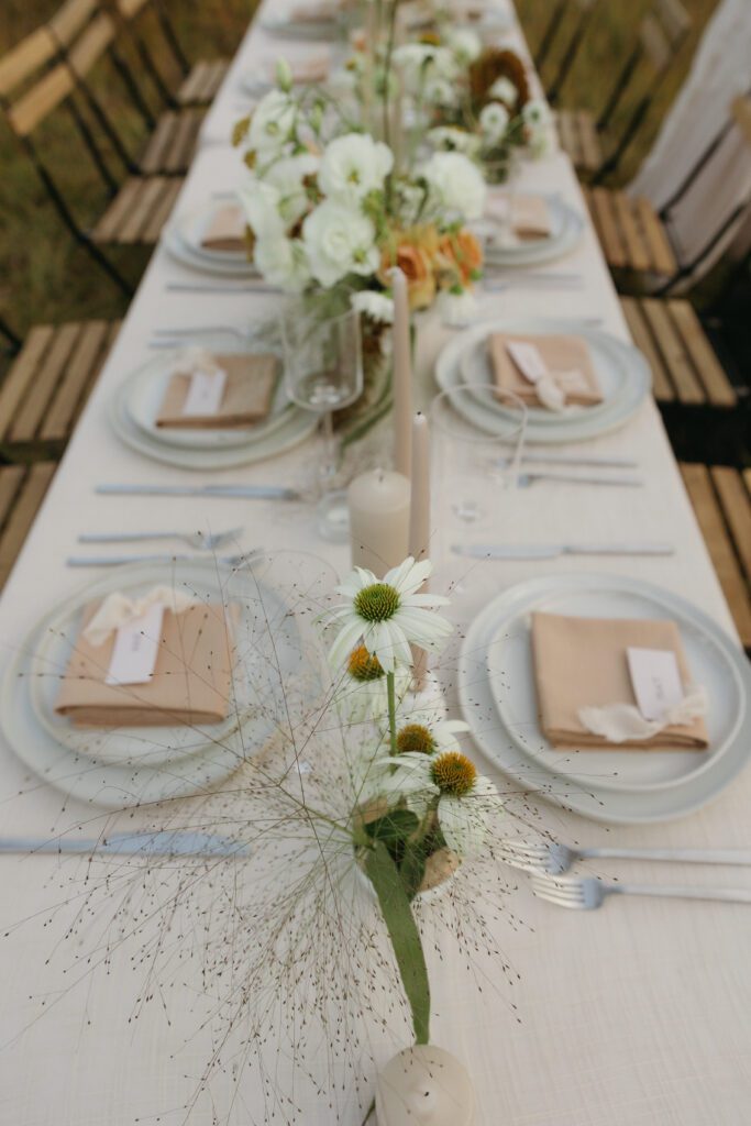 Close-up of the beautifully arranged tablescape at Bailey and Kyle's elopement, featuring intricate details and elegant decor.