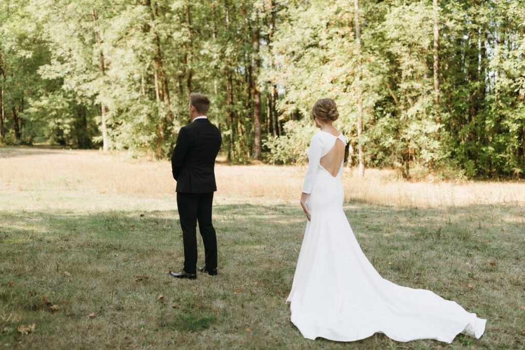 Bride and groom share a first look before their wedding ceremony 