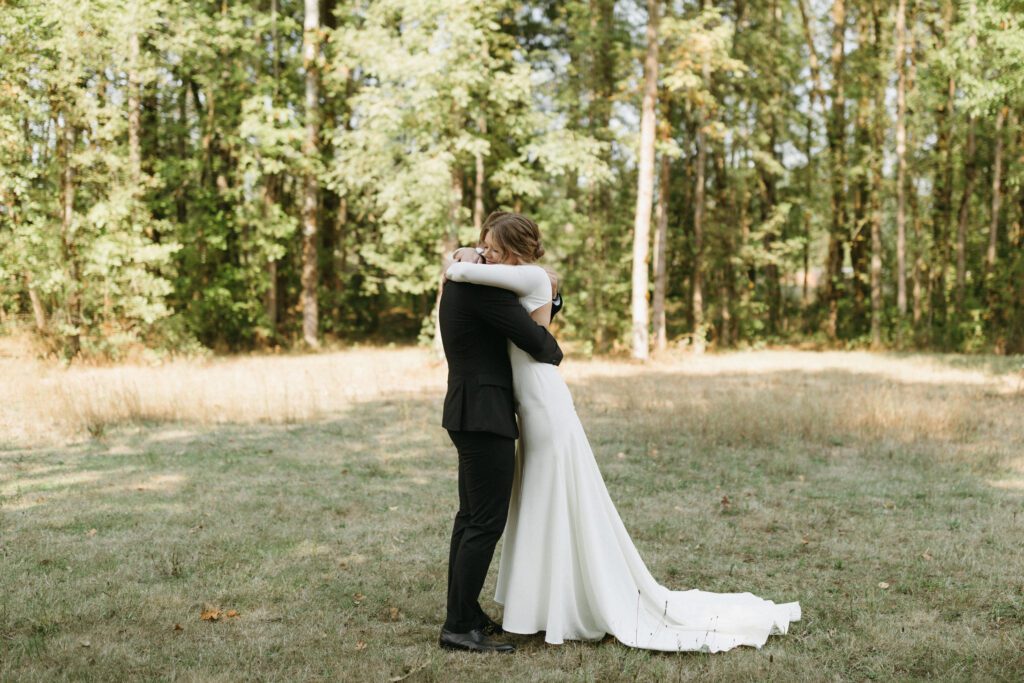 Bride and groom embrace after their first look 