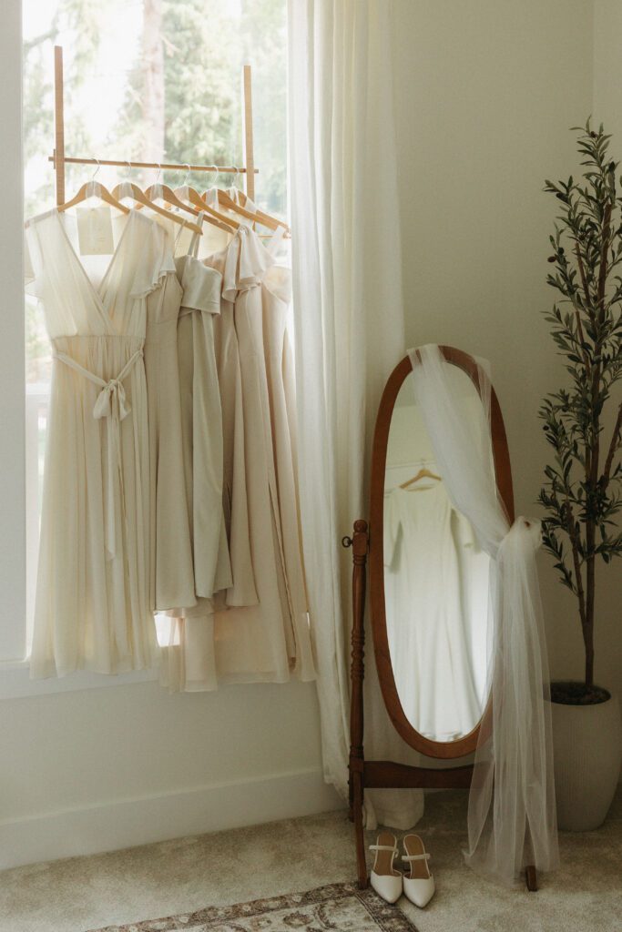 Bridesmaids wearing handpicked dresses in complementary styles and colors, each paired with carefully selected jewelry