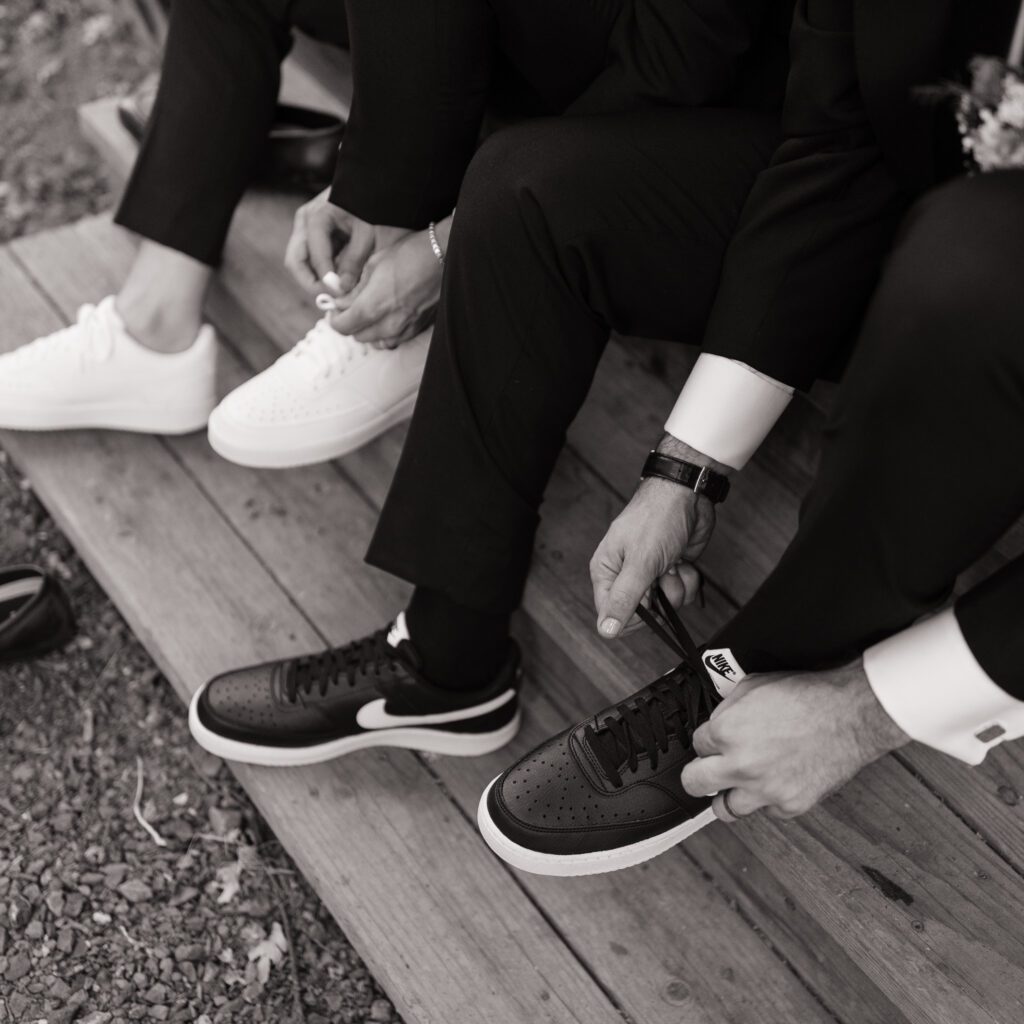 groom and groom shoe change during wedding reception