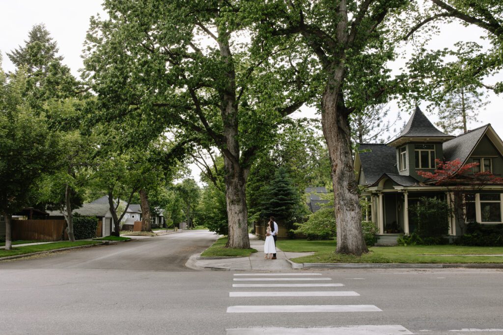 Boise couple strolling through downtown for their engagement photos