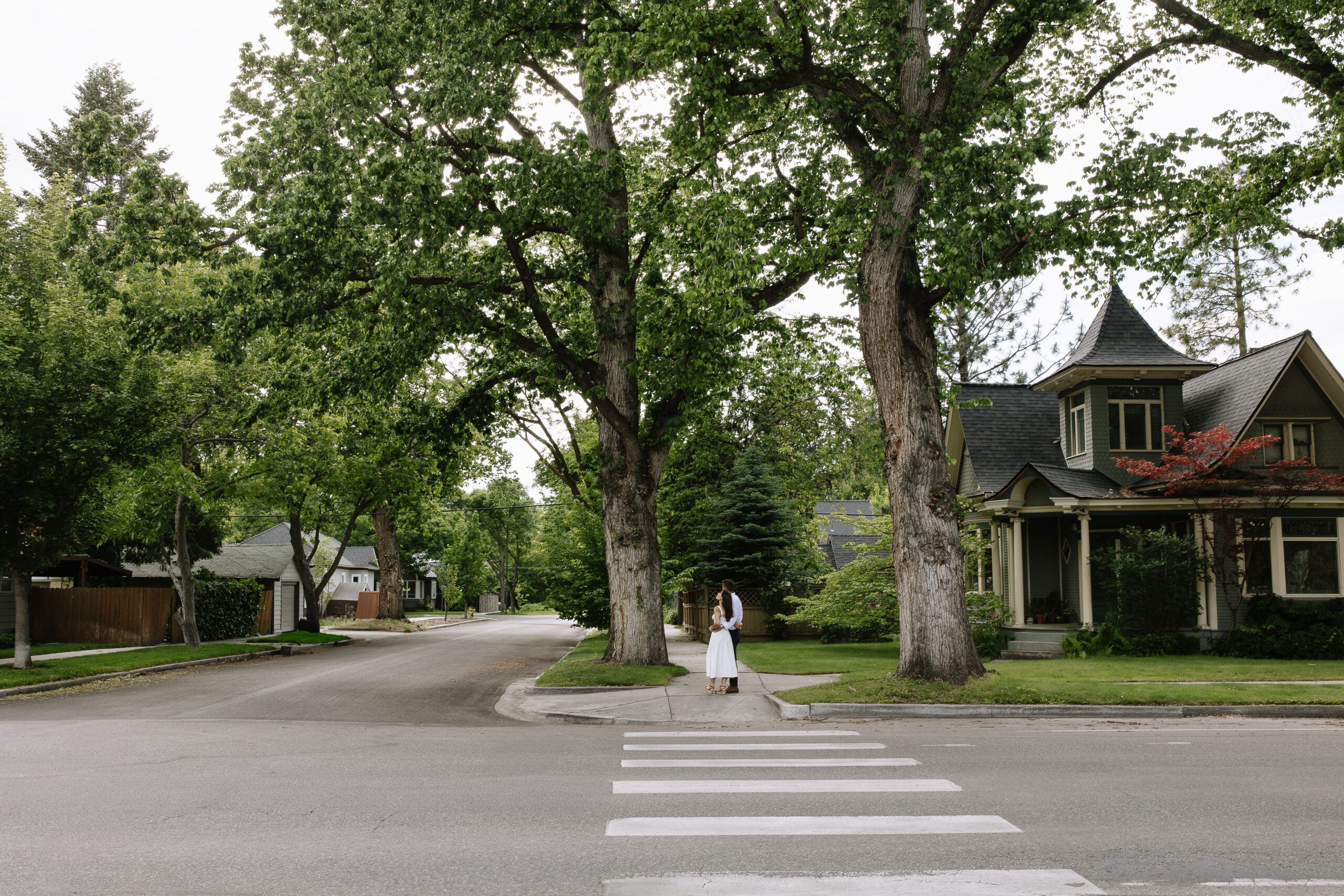 Boise couple taking a stroll downtown for their personalized engagement session