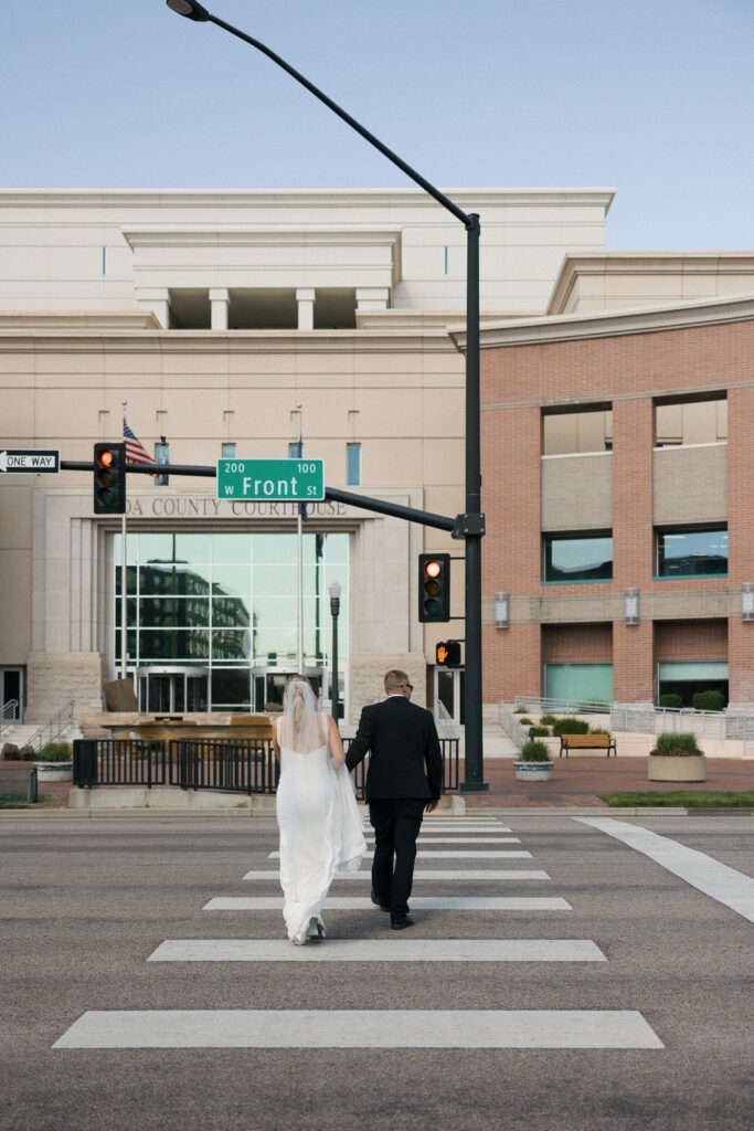 Couple exploring downtown Boise after their wedding ceremony.