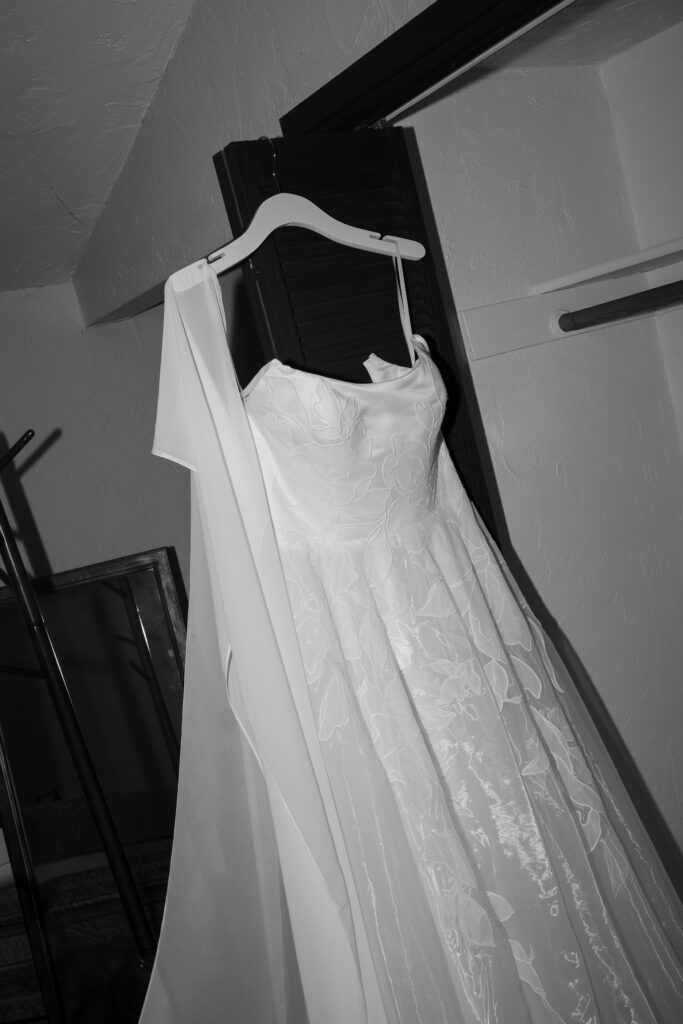 Bride steaming dress before her Oregon elopement ceremony.