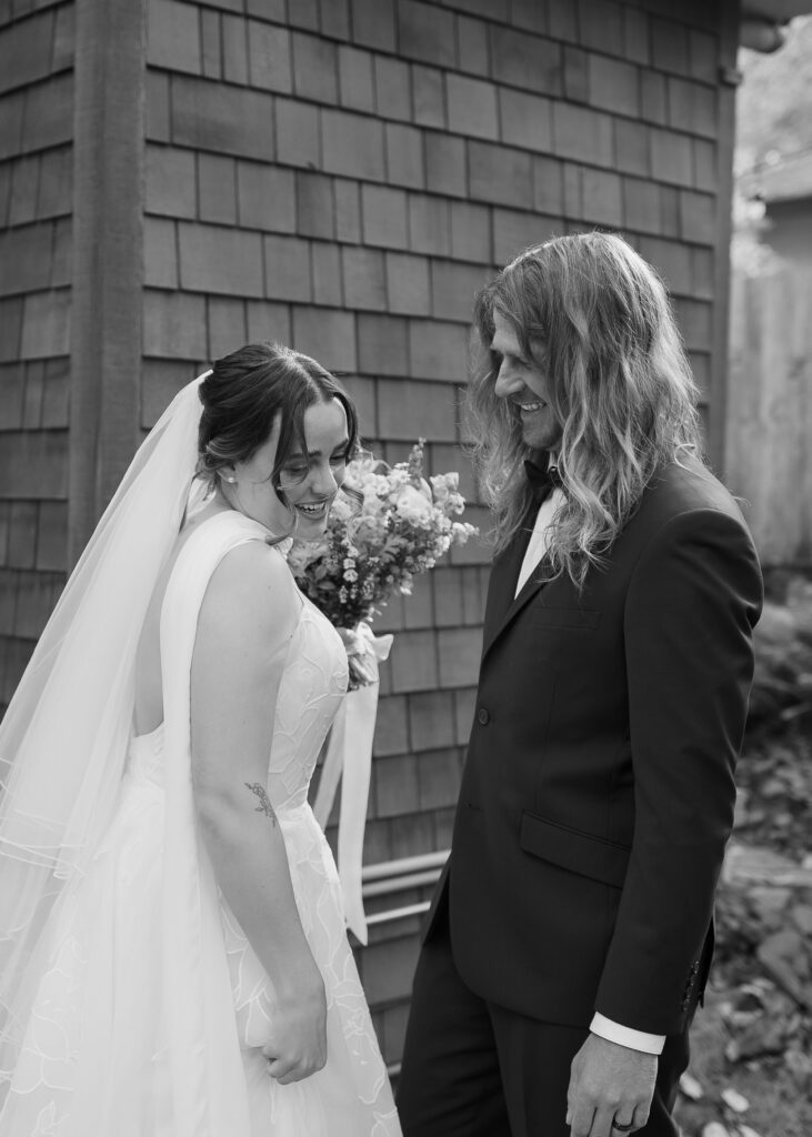 Couple laughing after private first look moment during Oregon elopement.