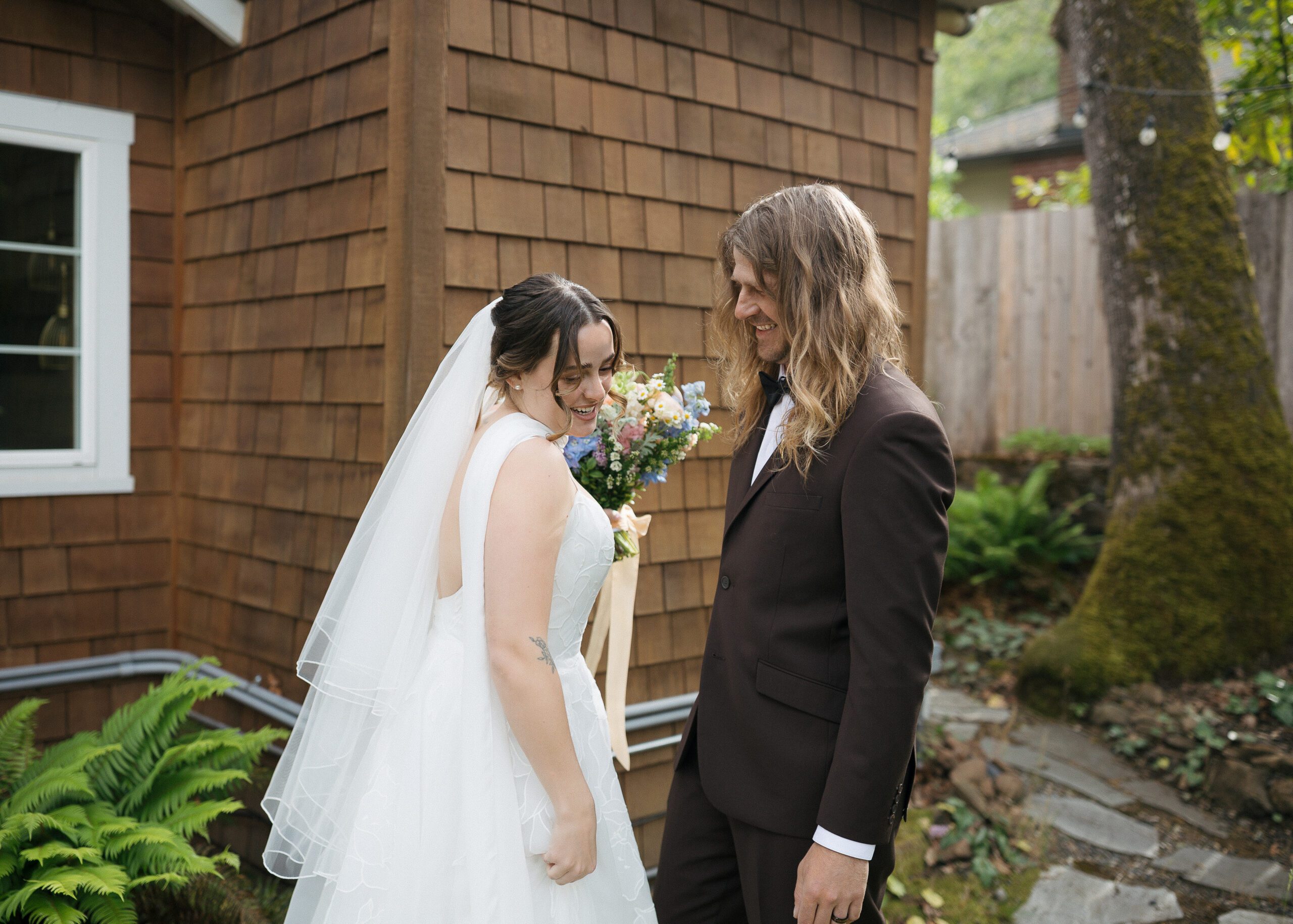 Couple reading private vows during their Oregon elopement.