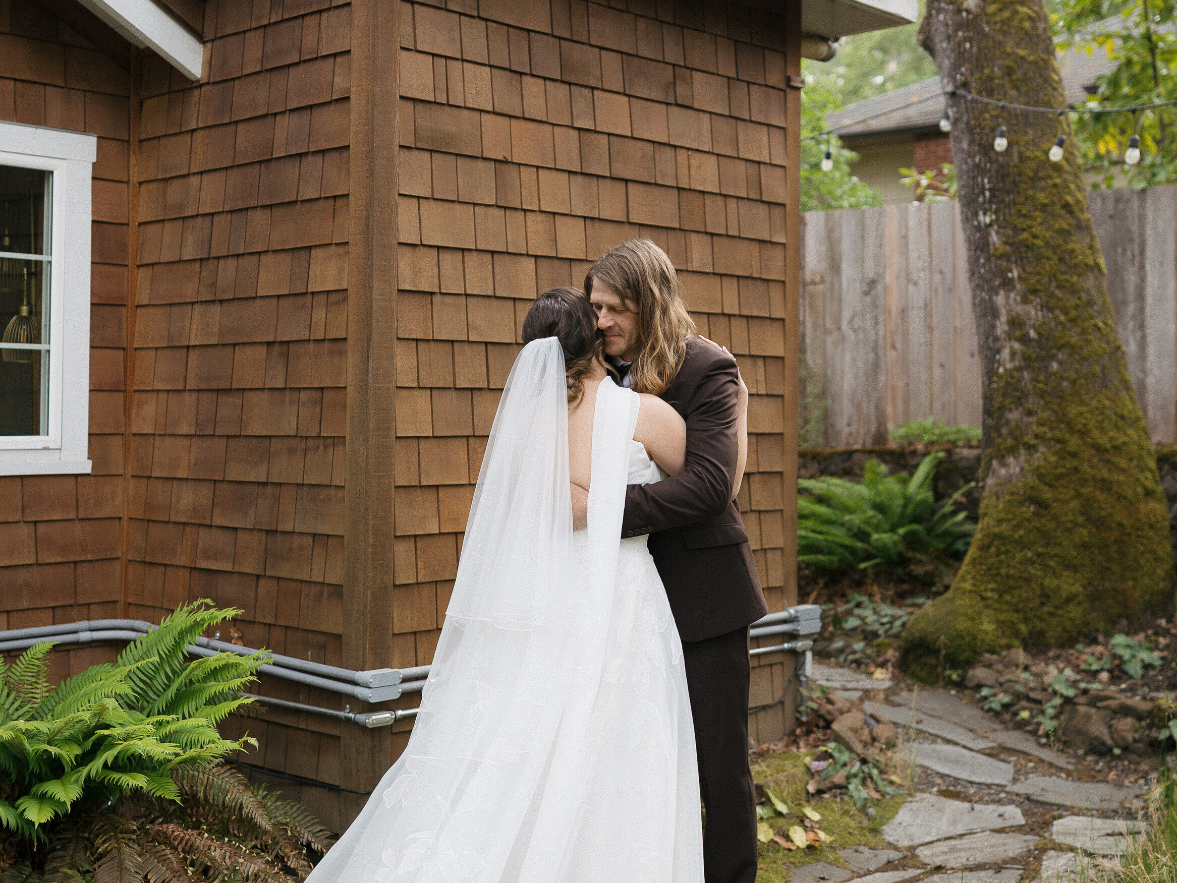 Couple embrace during an intimate Oregon elopement.