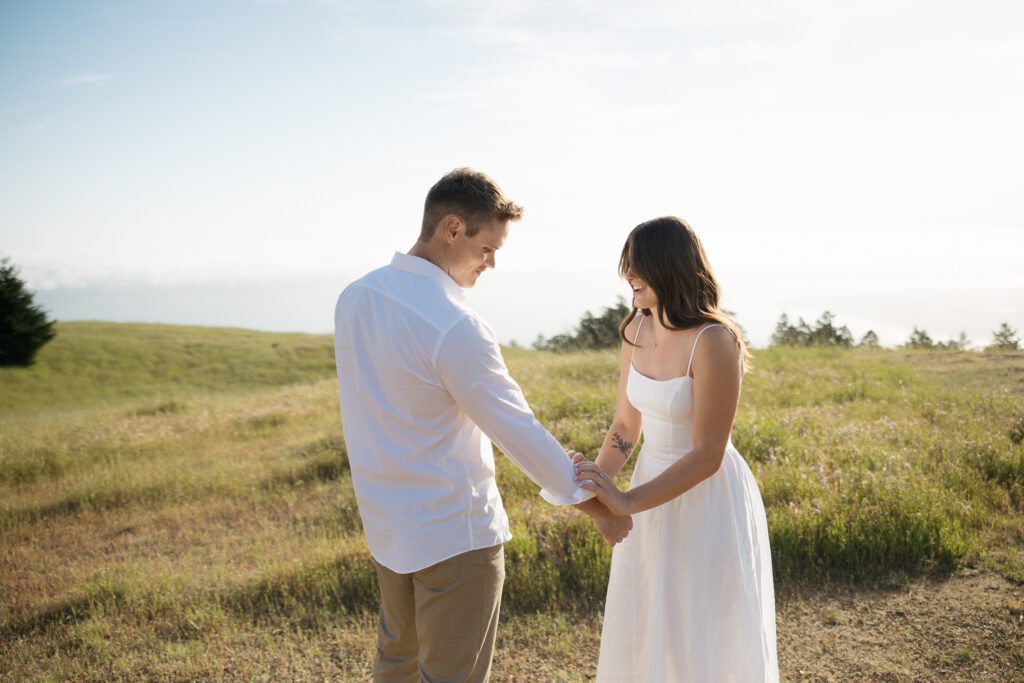 Candid moment of couple during engagement photos at mount tamalpais.