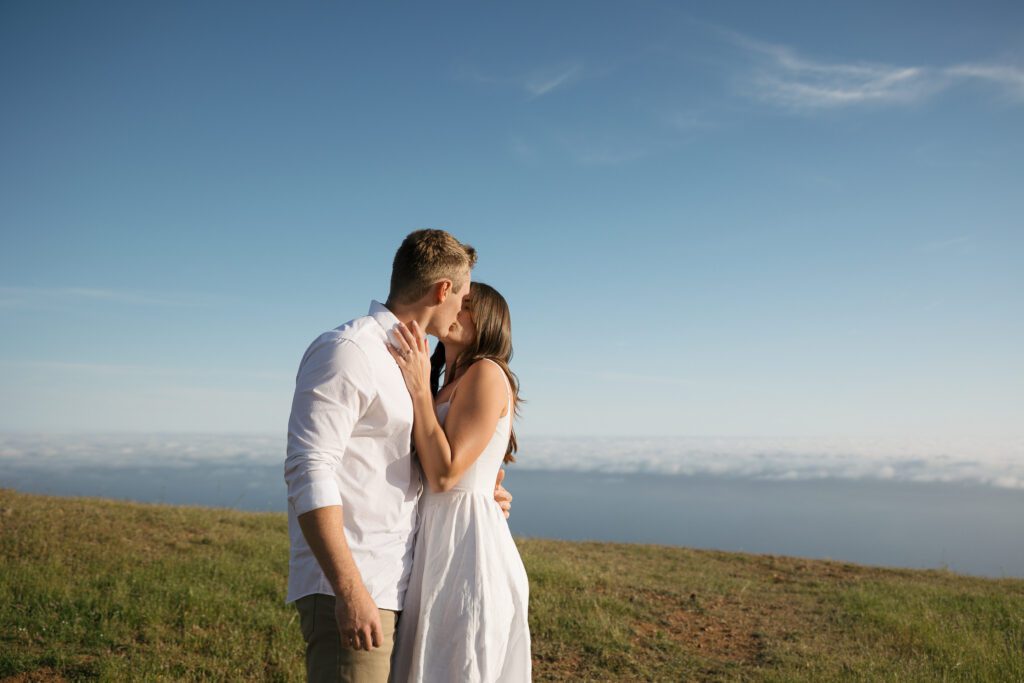 Environmental engagement portrait with sweeping California views.