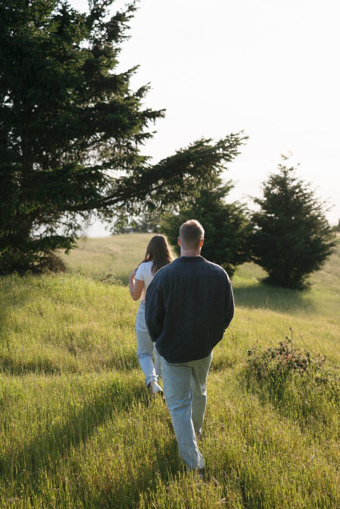 Couple exploring Mount Tamalpais together during their engagement session.