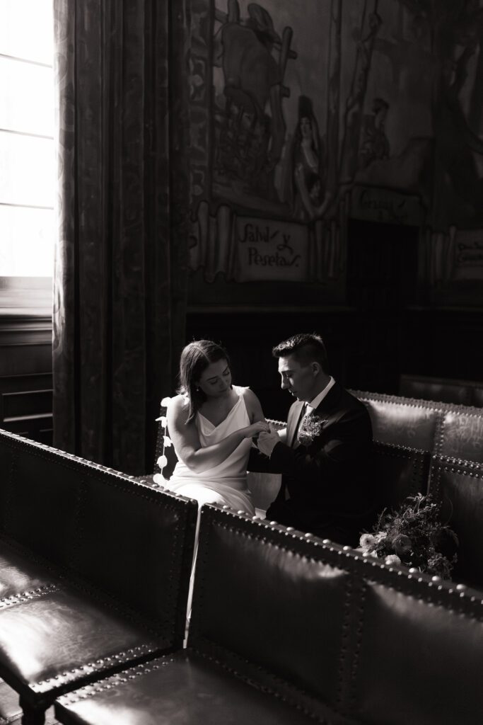 Quiet moment between the newlyweds after their courthouse ceremony.