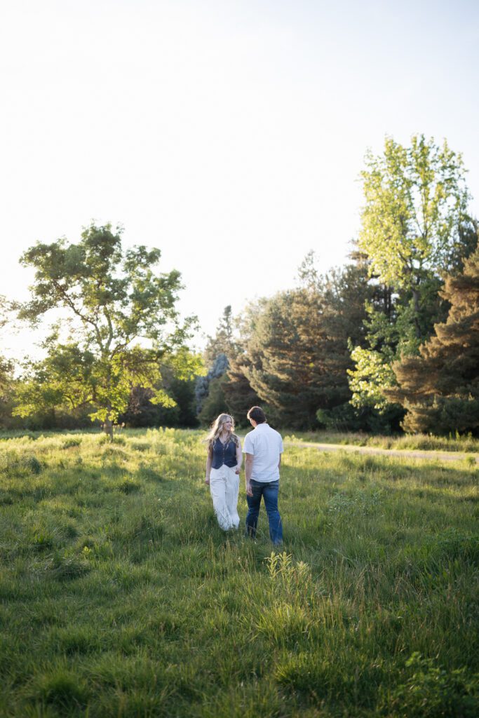 Romantic engagement photos surrounded by wildflowers near Boise, Idaho.
