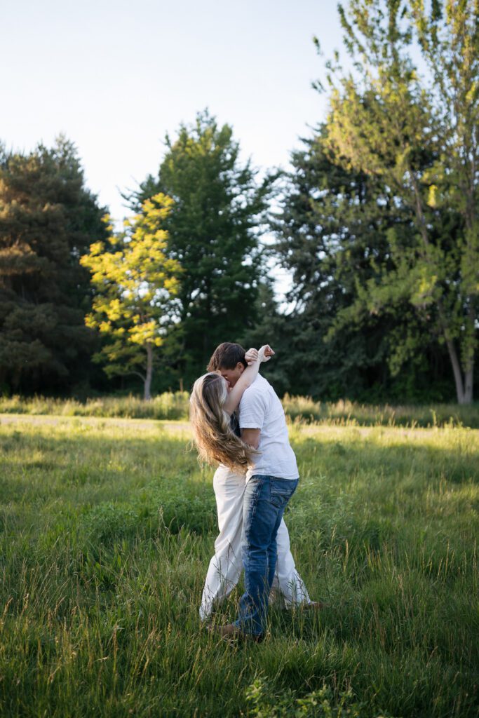 Romantic engagement photos in a quiet meadow in Boise.
